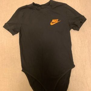 Nike bodysuit size Small. Never before worn.